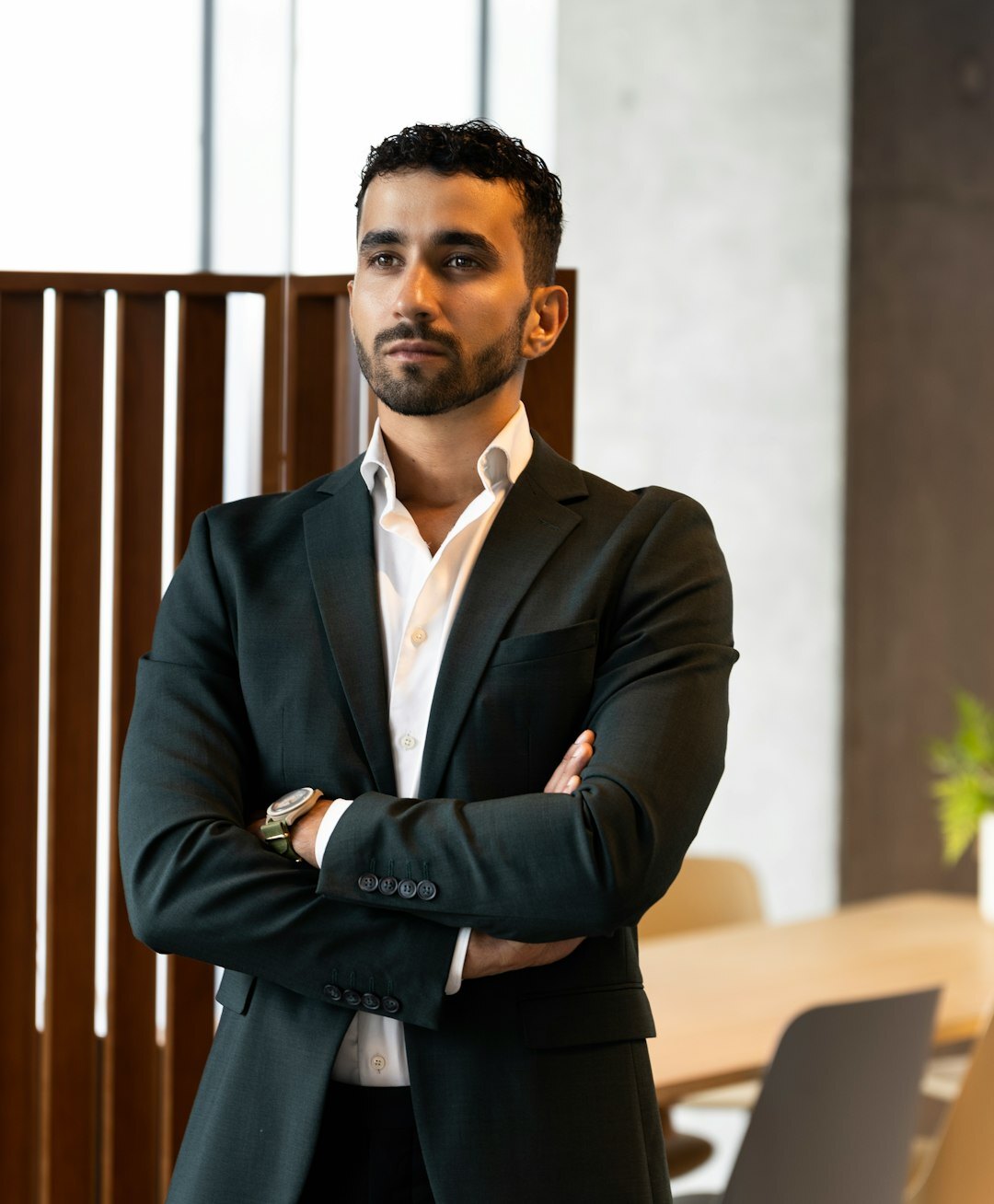 Studio portrait of a Belgian business consultant in a blazer